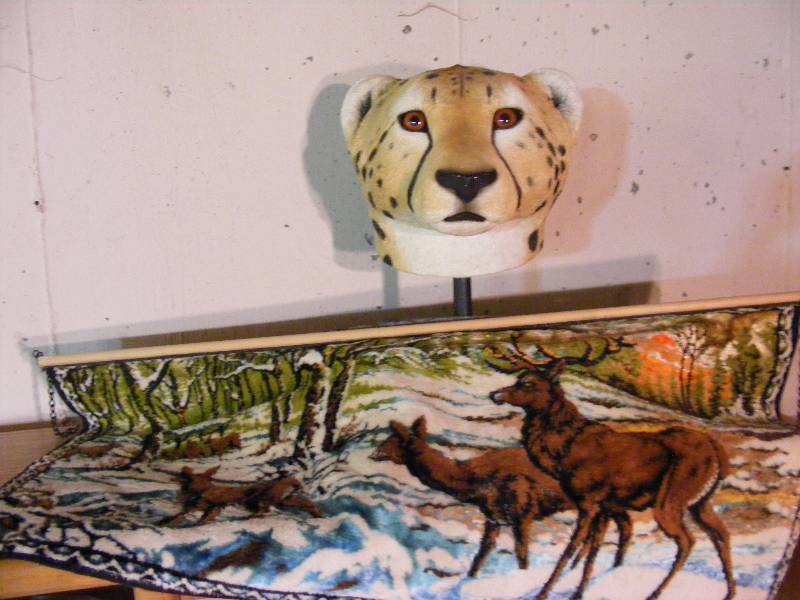 Sculpted Tiger Head on Pedestal and Deer Table Runner