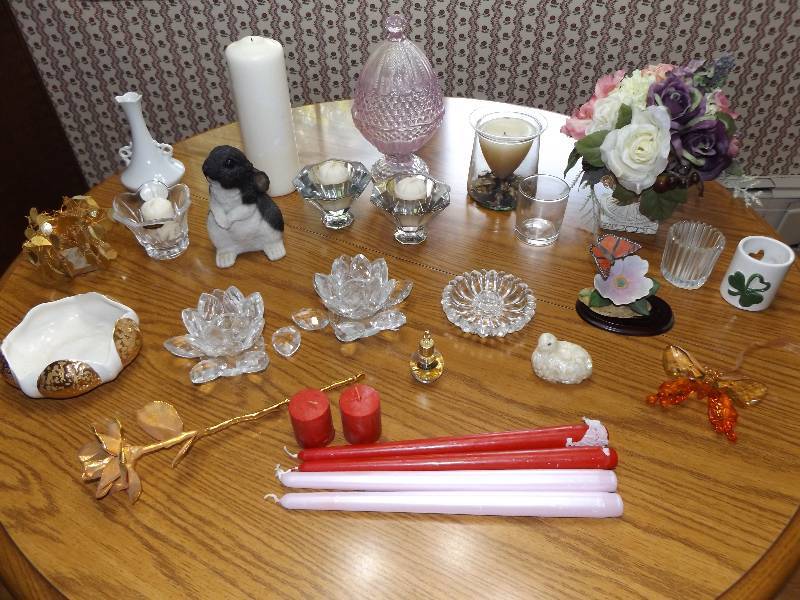 Candles, candle holders, decorations, gold flakes.