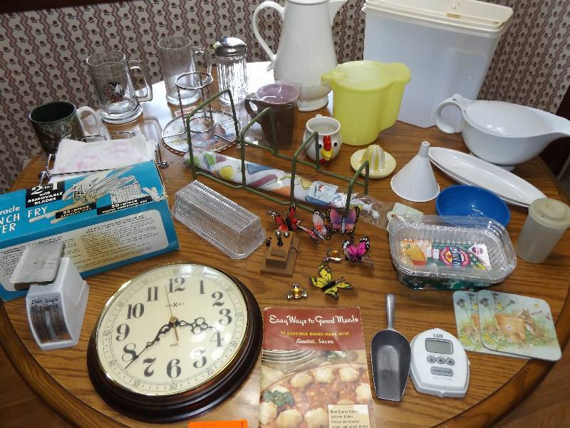 Fighting Sioux mug, coffee pot, misc tupperware, french fry cutter, clock, misc.