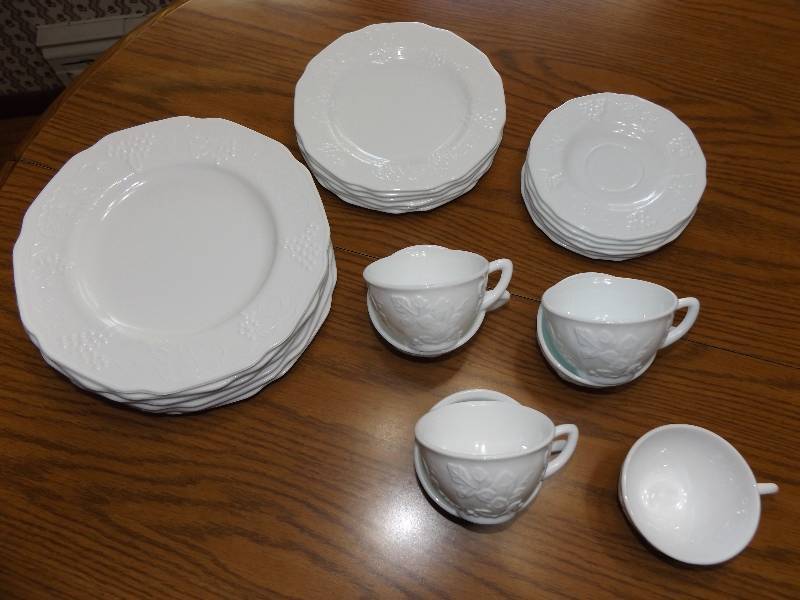 White grapevine dish set includes 7 cups, 6 lg plates, 6 med plates, 6 saucers, 6 goblets, 1 vase.