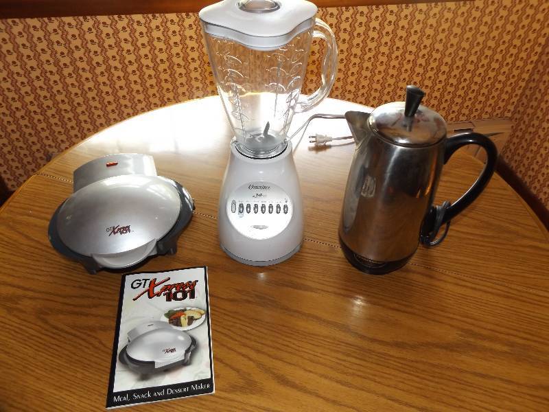 GT Xpress 101, Osterizer blender, coffee pot.