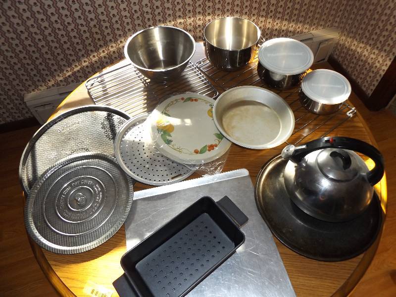 Sheetpan, pizza pans, teapot, metal bowl set, racks, misc.
