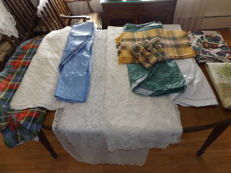 8 tablecovers, 1 bolt lace fabric, 4 placemats & napkins.