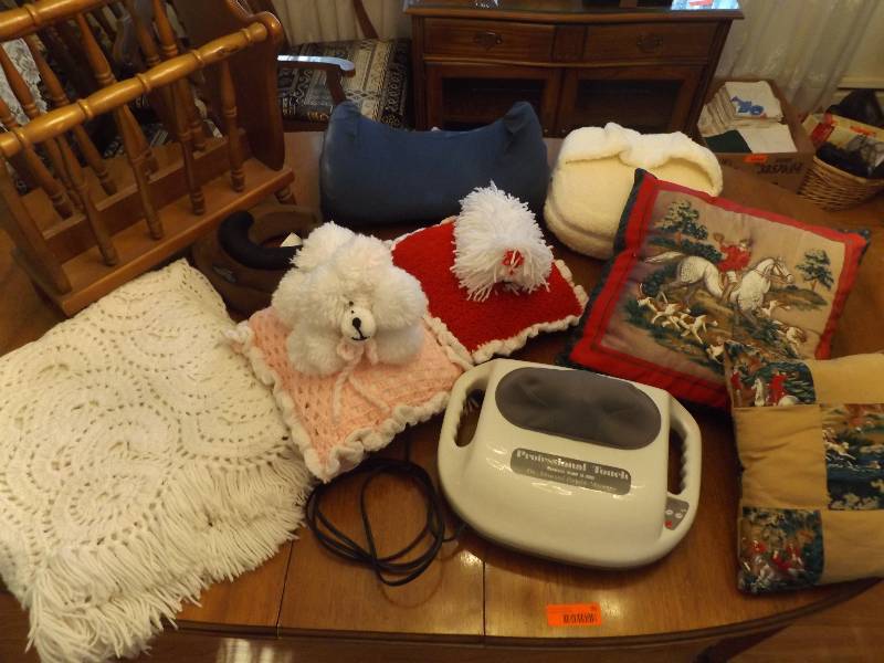Magazine rack, pillows, massagers.