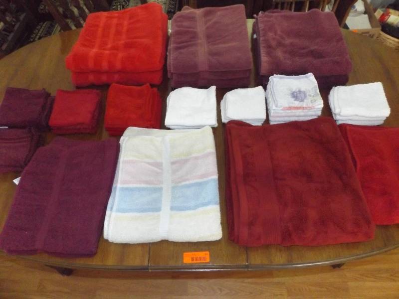 Bath towels and washclothes, laundry basket.