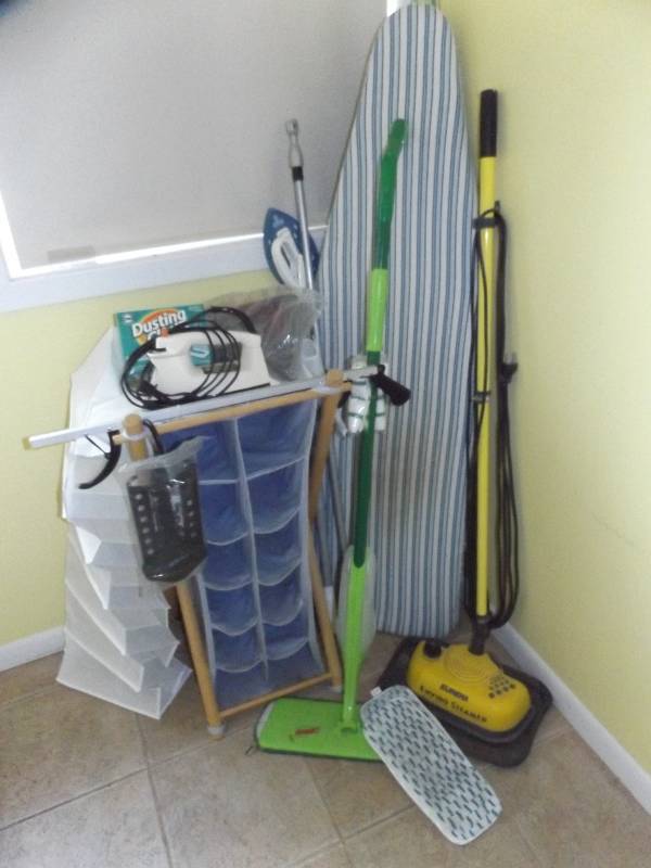 Shoe holders, Eureka Enviro Steamer, ironironing board, mops, etc.