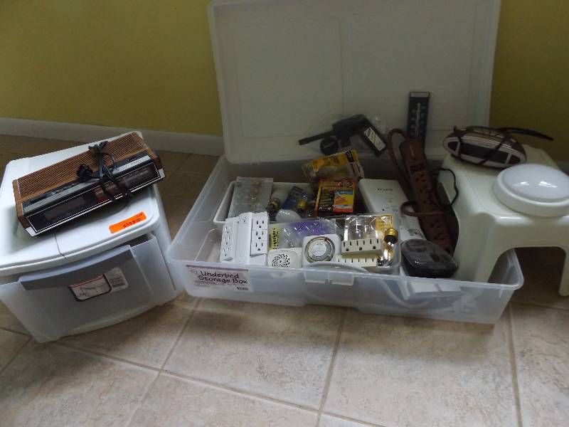 Storage totes, light bulbs, stool, alarm clocks, misc.