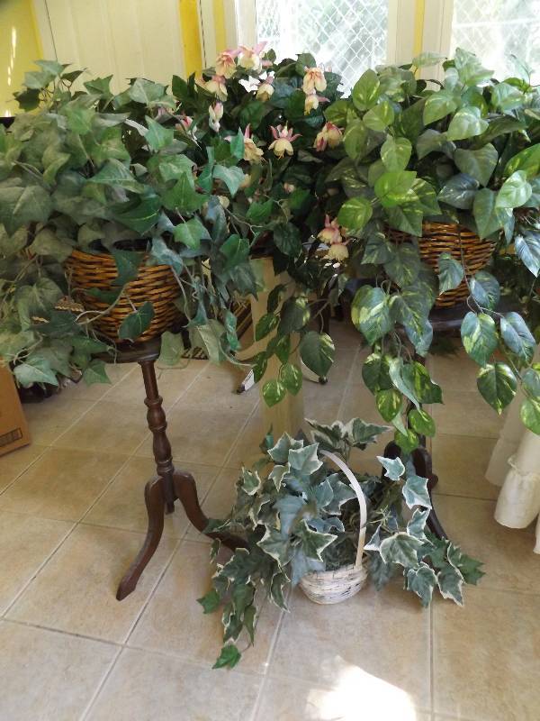 3 plant stands, 4 fake plants