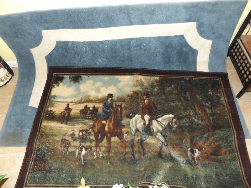2 rugs (blue, hunting scene)
