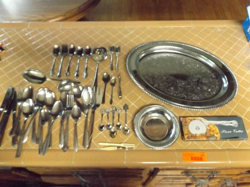 Silver platters, variety of silverware (some antique).