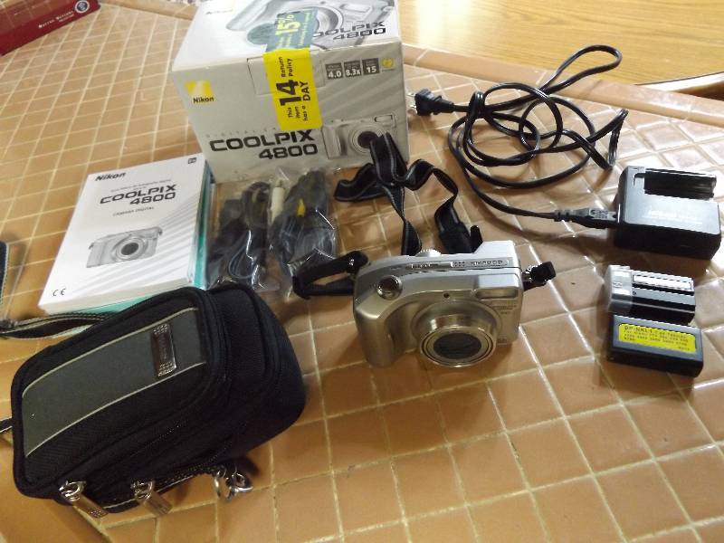 Nikon Coolpix 4800 camera with case, cords, batteries, battery charger.
