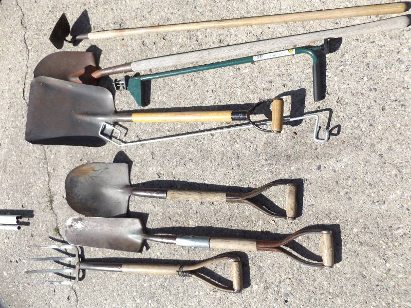 4 shovels, potato fork, hoe, aerator