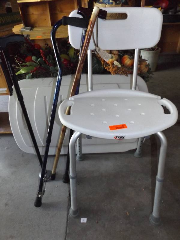Shower chair and 4 canes.