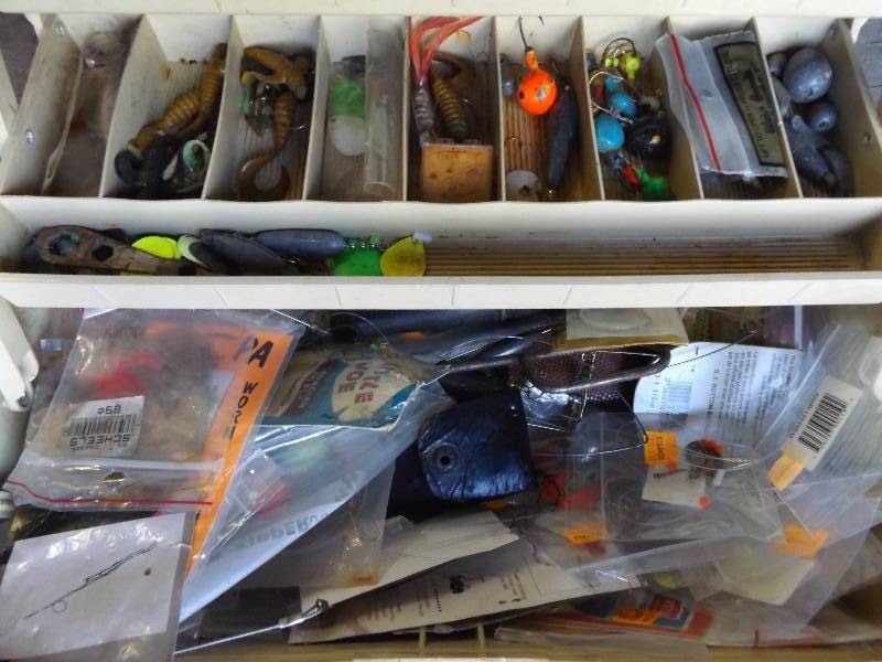 Variety of antique tackle and tackle box