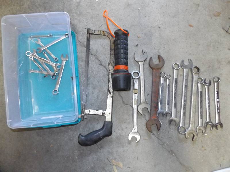 Hand saw, flashlight, wrenches (some Craftsman)