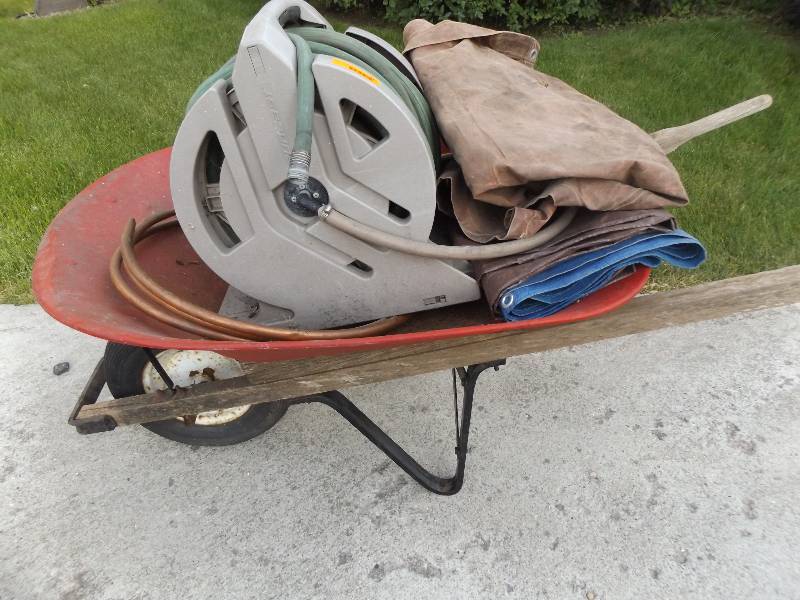 Wheel barrow, hose reel with hose, 2 tarps, copper tubing
