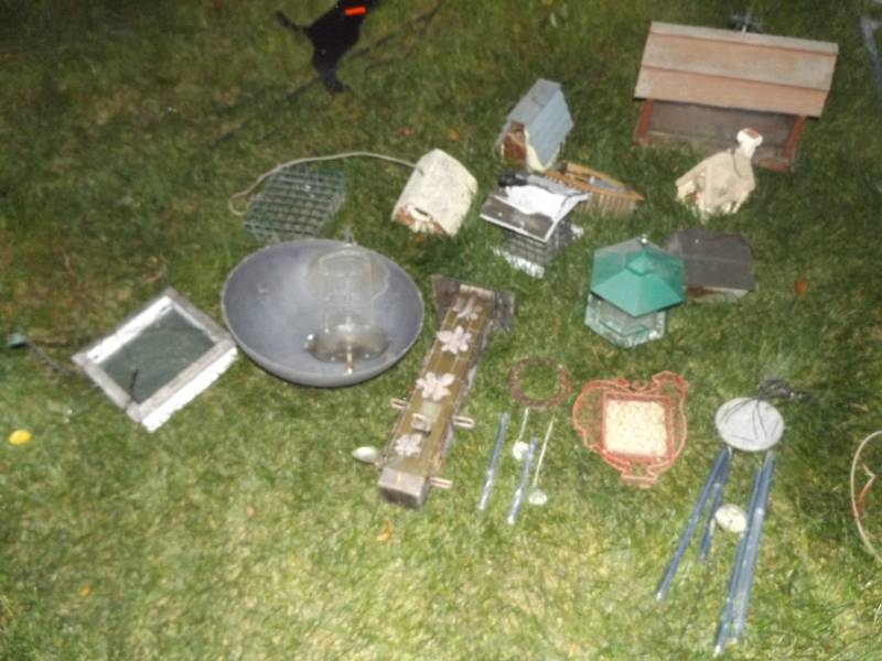 Assorted bird houses, feeders, wind chimes