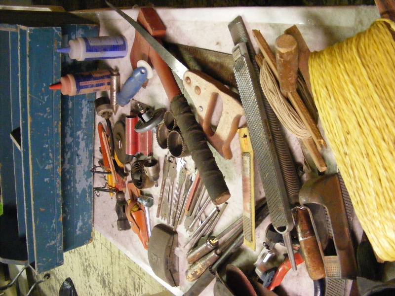 Blue Wood Tool Box, Sanding Discs, Knee Pads, Twine, Ax, Rasps, Drill Bits, Saw, Blades