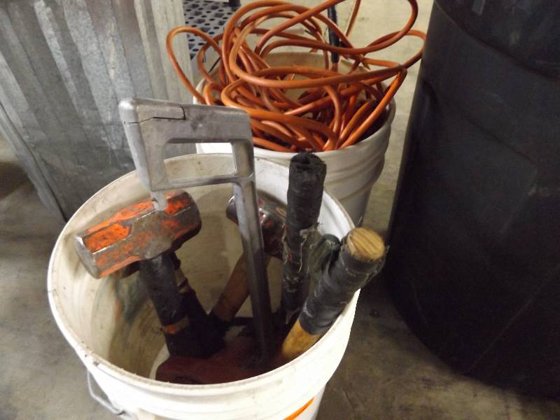 Bucket with Extension Cord, Hammers and Hatchet