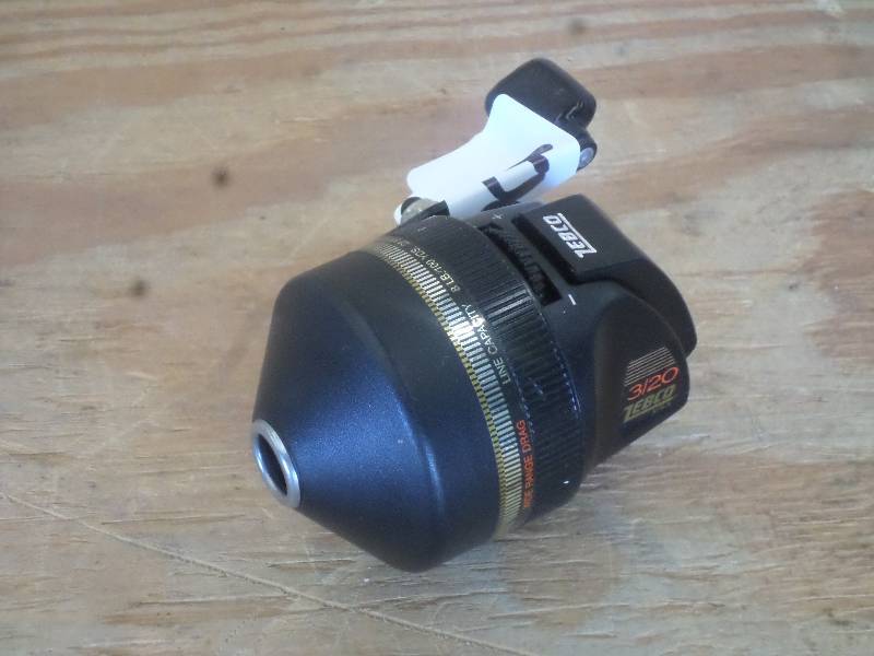 lot 100 image: Zebco 320 Spin-Cast Reel ...