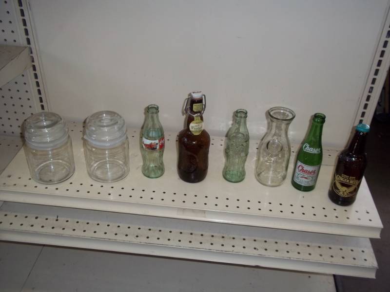 lot 32 image: Coke bottles and beer bottles