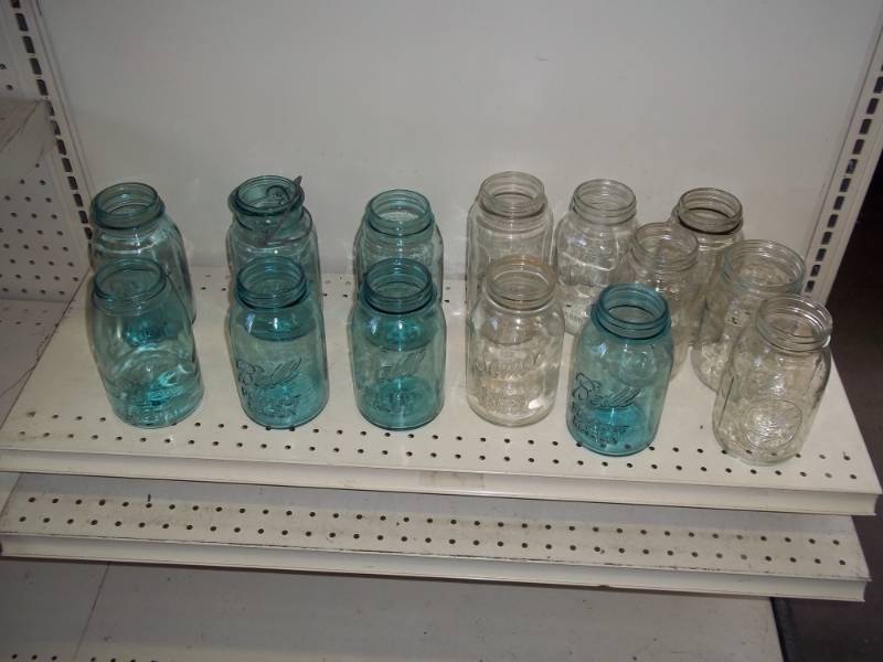 lot 35 image: Lot of 14 Canning Jars  7 Blue, 7 Clear