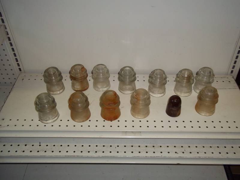 lot 38 image: 13 Glass Insulators