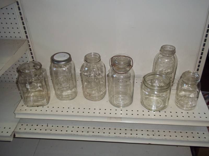 lot 47 image: Lot of 5 Canning Jars one with glass lid and 2 storage jars