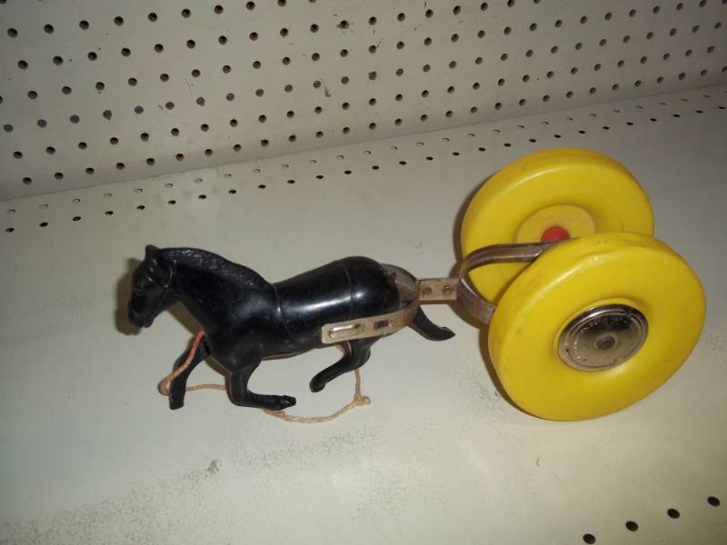 lot 110 image: Vintage toy horse with bell
