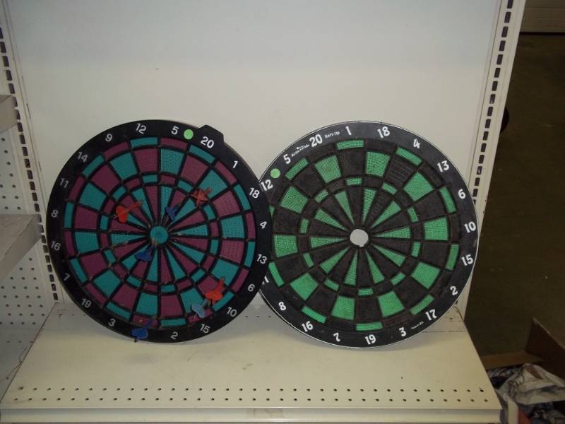lot 132 image: Pair of dart boards with darts