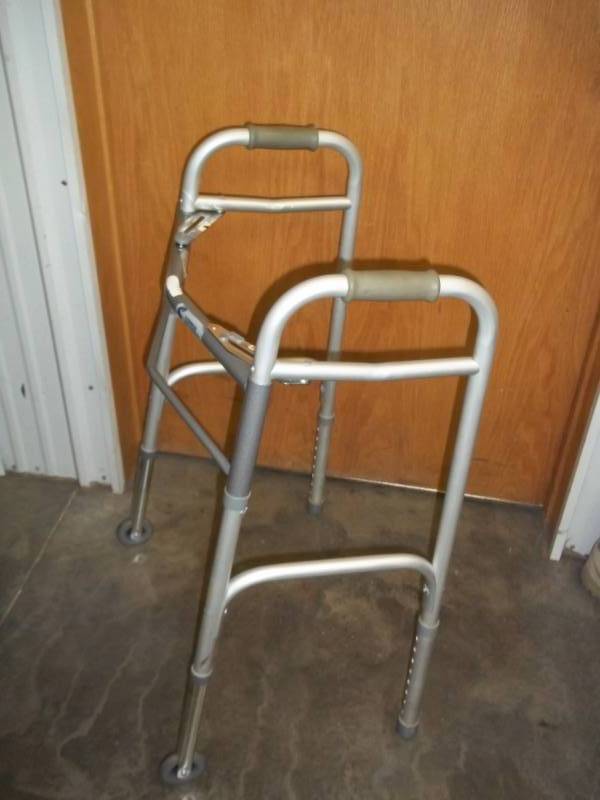 lot 136 image: Folding walker with wheels