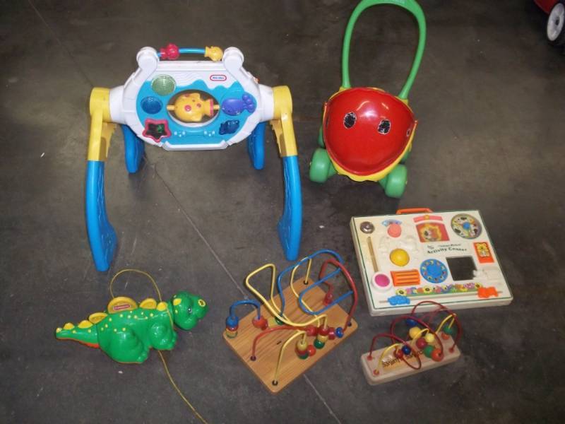 lot 148 image: Kids toys including stroller, vintage crib activity center