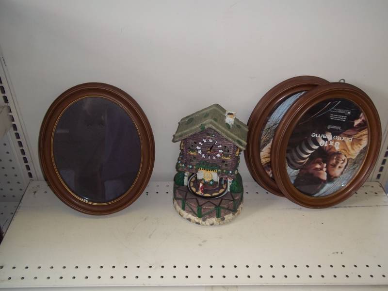 lot 175 image: Picture frames and clock