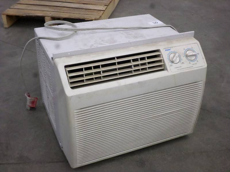 lot 10 image: Haier Portable Window AC Unit ...
