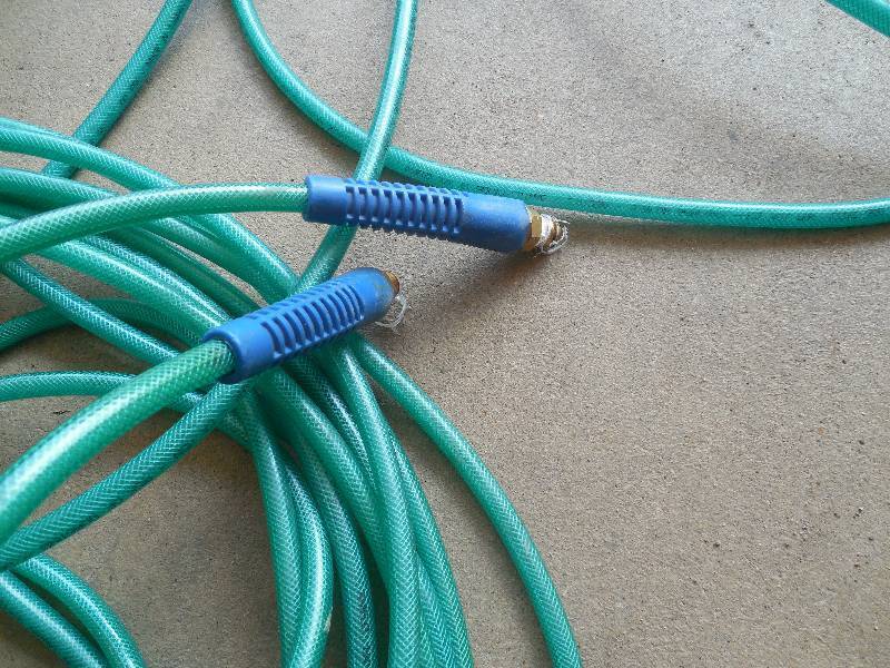 lot 5 image: 100 roll of 14inch polyurthane hose with threaded ends