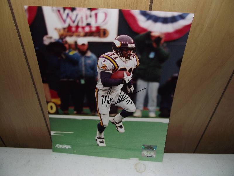 lot 36 image: Moe Williams #21, signed, unframed in sleeve,