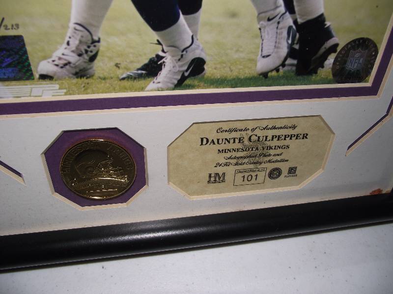 lot 38 image: 101213 Daunte Culpepper, framed, signed, Certificate of Authenticity