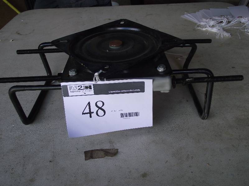 lot 48 image: Seat swivel that clamps to bench seat.