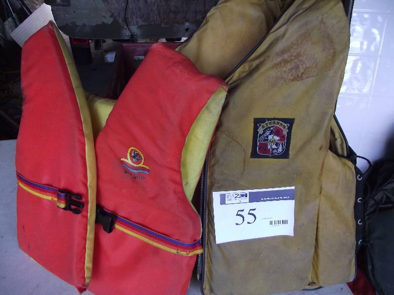 lot 55 image: 2 adult life vests 1 Stearns 1 black Sheep