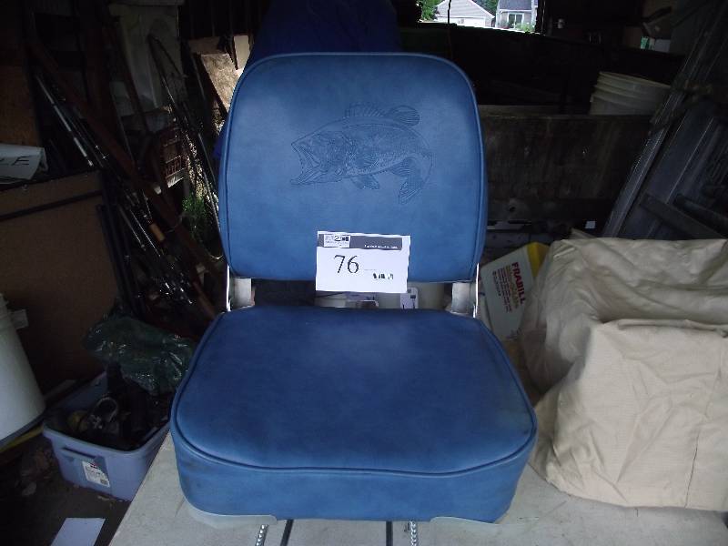lot 76 image: Swivel seat that clamps to a bench seat.