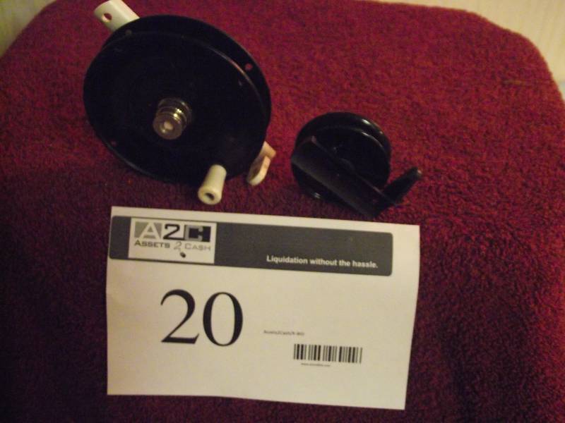 lot 20 image: 2 ice fishing or cane pole reels.
