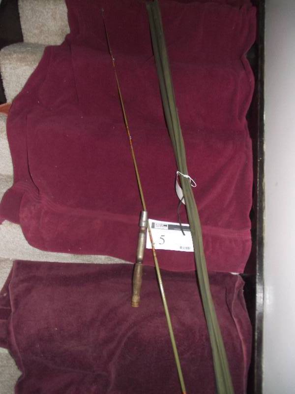 lot 5 image: Glass round casting rod 68in. long with soft linen case.