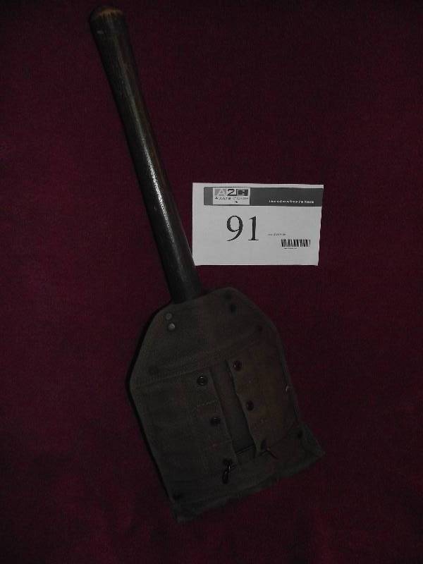 lot 91 image: Vintage military entrenching tool with sheath