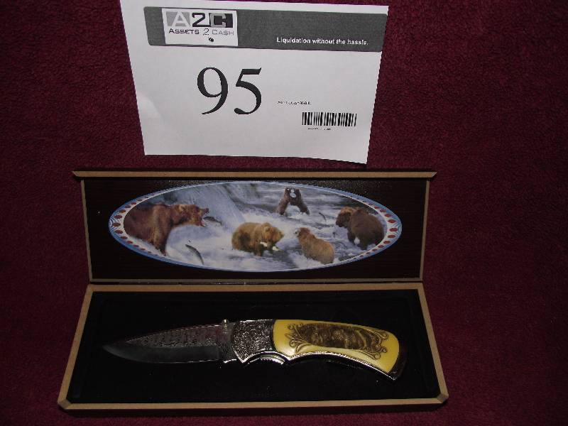 lot 95 image: Engraved knife in box engraved with bears