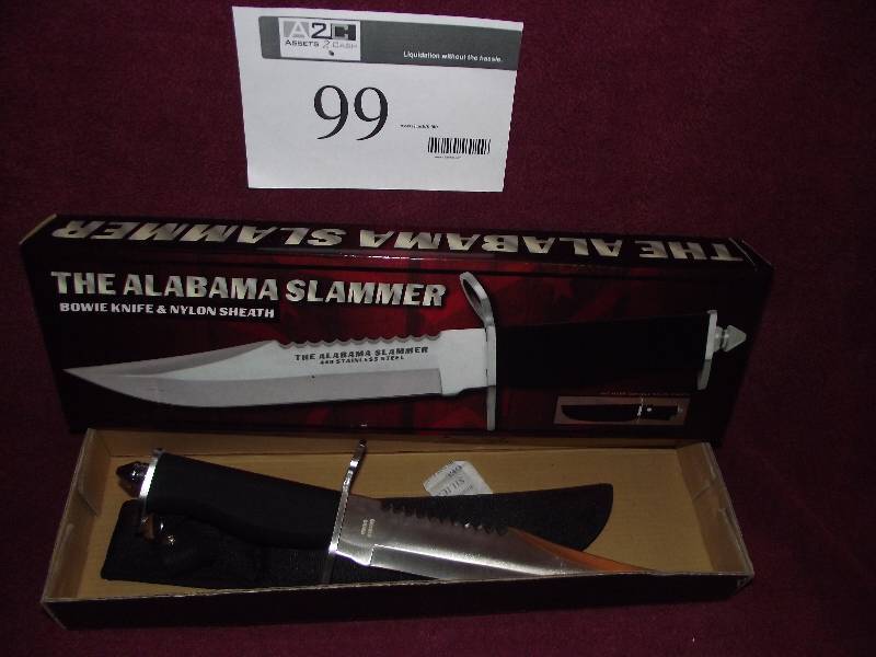 lot 99 image: Alabama Slammer Bowie knife with sheath still in original box