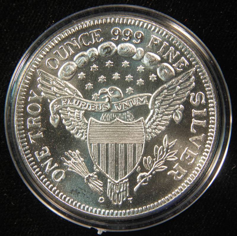 lot 21 image: 1 TROY Oz. .999 FINE SILVER ROUND DRAPED BUST STYLE IN PLASTIC HOLDER