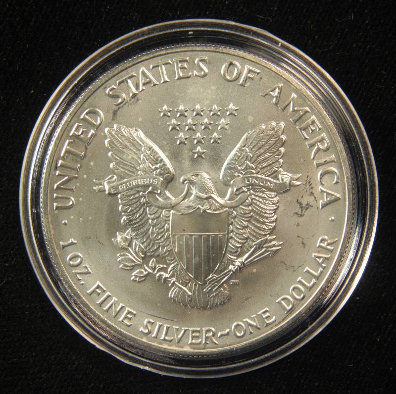 lot 50 image: 1991 AMERICAN SILVER EAGLE 1 TROY OZ. .999 FINE SILVER DOLLAR BU UNC IN AIRTITE CAPSULE