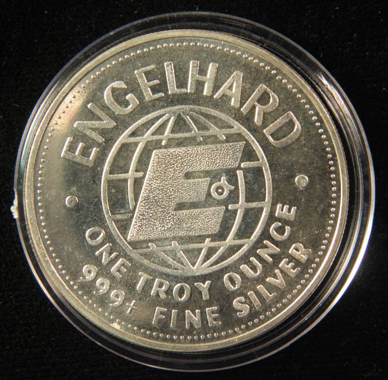 lot 57 image: 1 TROY OZ. .999 FINE SILVER ENGELHARD THE AMERICAN PROSPECTOR ROUND 1984 IN AIRTITE HOLDER