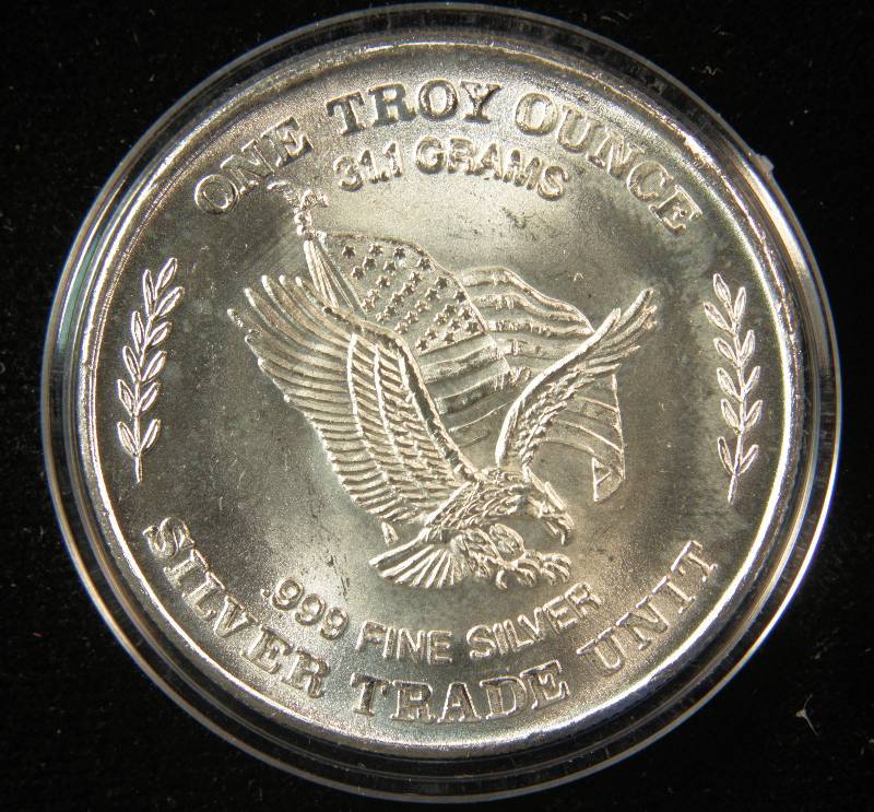 lot 71 image: PRE AMERICAN SILVER EAGLE 1 TROY OZ. .999 FINE SILVER ROUND MINTED FROM STRATEGIC STOCKPILE OF SILVER STORED AT US ASSAY OFFICE SAN FRANCISCO 1981
