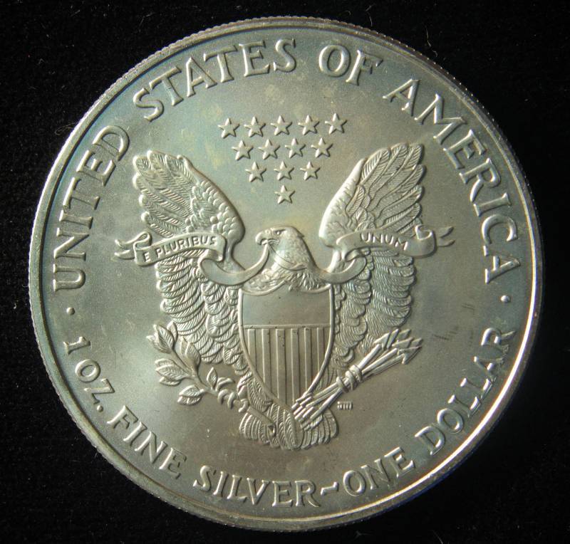 lot 82 image: 2006 AMERICAN SILVER EAGLE 1 TROY OZ. .999 FINE SILVER DOLLAR